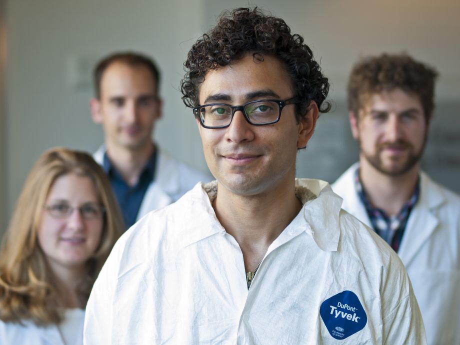 students in white lab coats.
